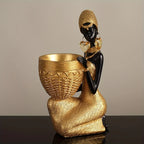 Resin Sculpture of an African Woman  Gold and Black