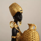 Resin Sculpture of an African Woman  Gold and Black