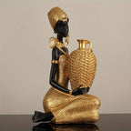 Resin Sculpture of an African Woman  Gold and Black