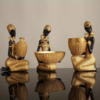 Resin Sculpture of an African Woman  Gold and Black