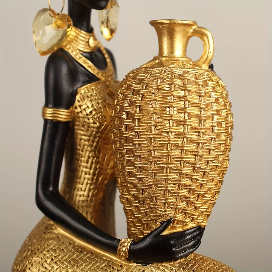 Resin Sculpture of an African Woman  Gold and Black