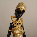 Resin Sculpture of an African Woman  Gold and Black