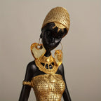 Resin Sculpture of an African Woman  Gold and Black