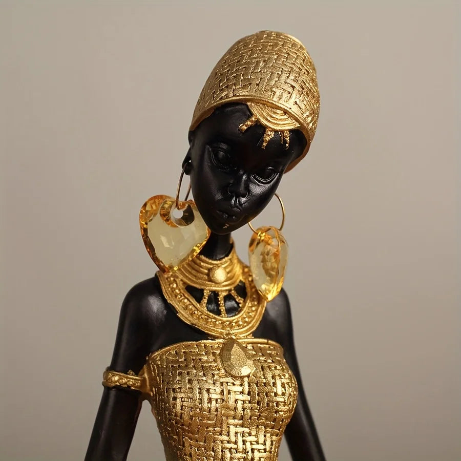 Resin Sculpture of an African Woman  Gold and Black